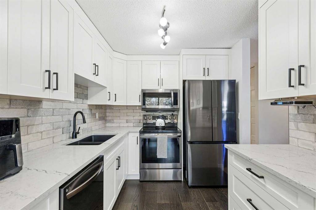 128-6100 4 Avenue NE